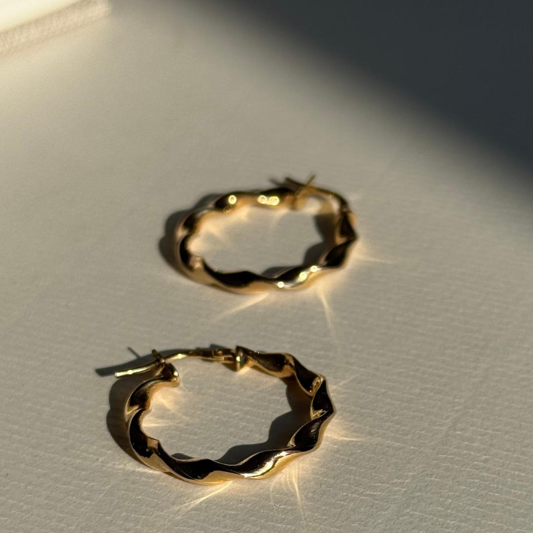 Gedraaide hoops | 9k Oorbellen M